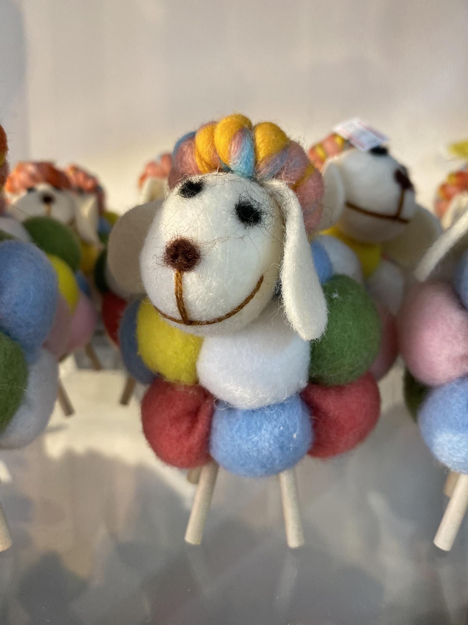 Colorful sheep with stick legs