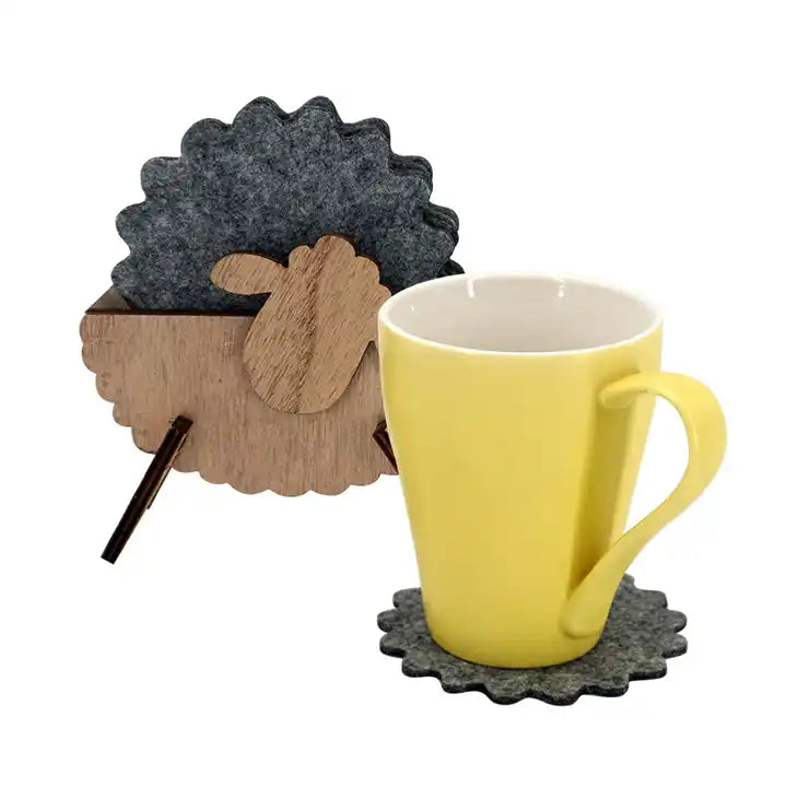 Big sheep-shaped felted mug coasters in dark grey