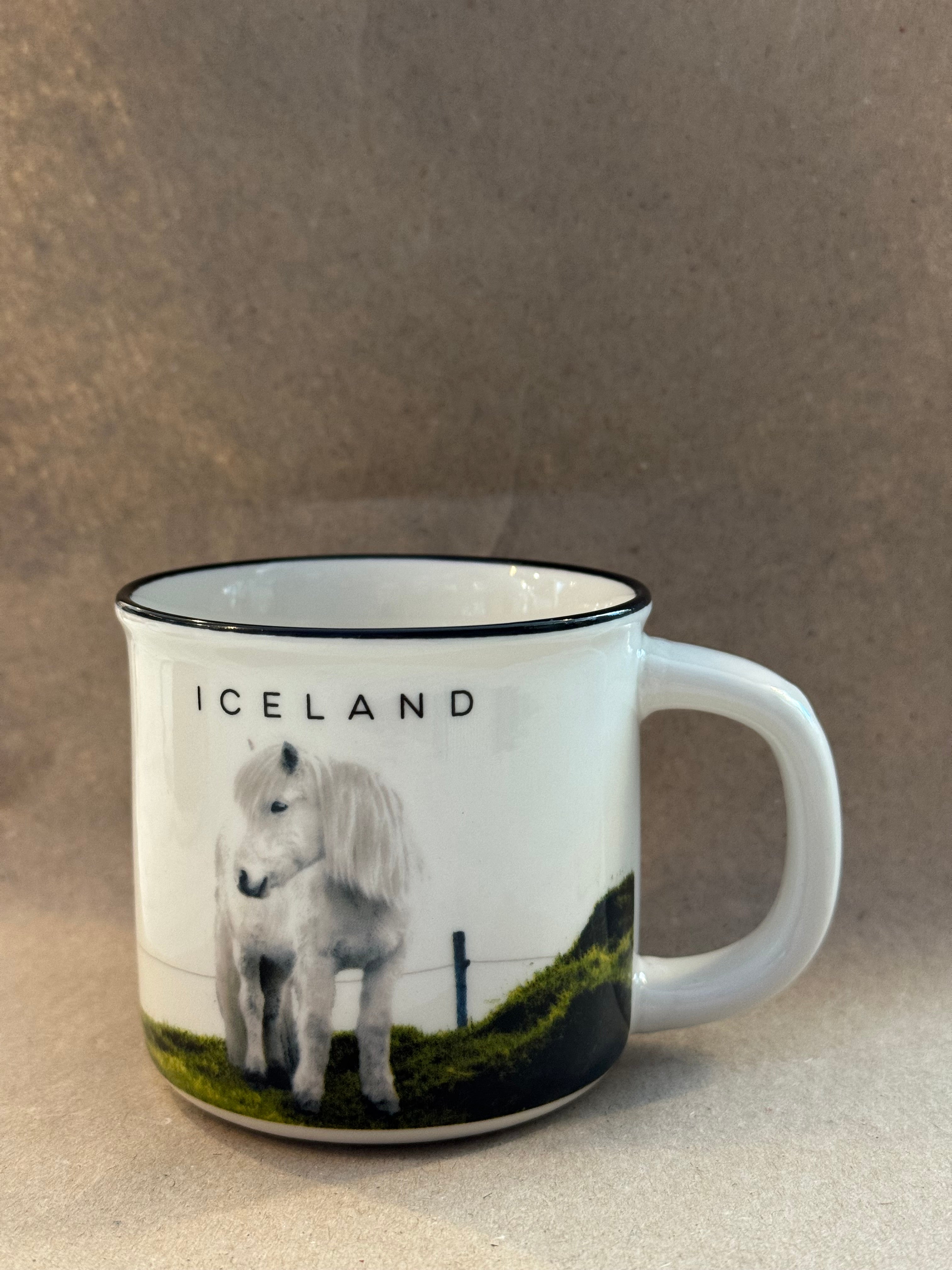 Ceramic cup by Bókafélagið