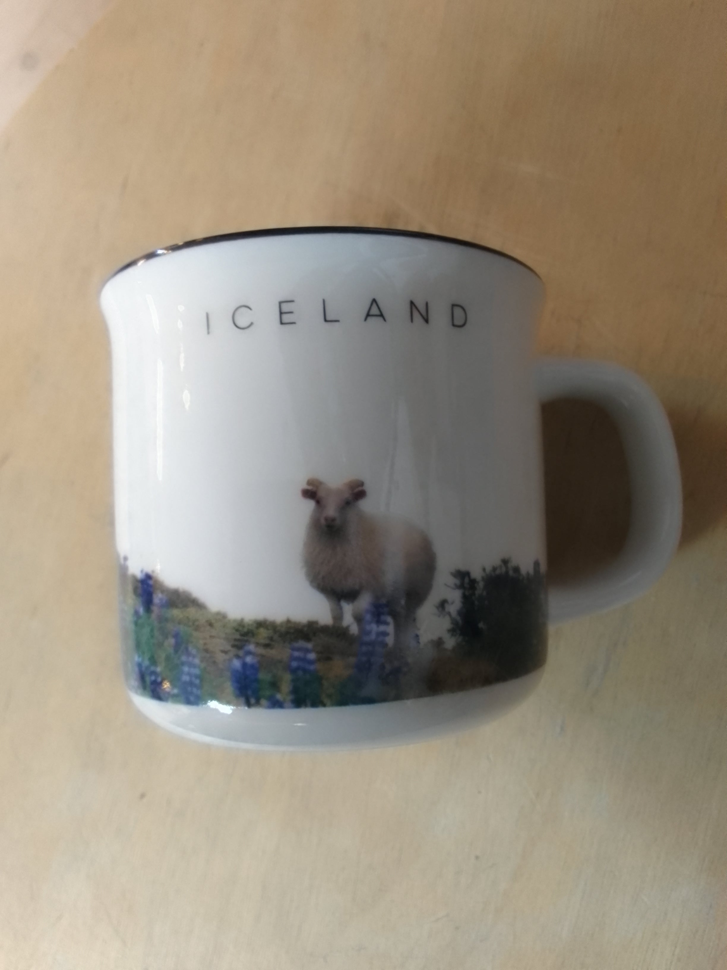 Ceramic cup by Bókafélagið